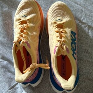 Brand New! Never Worn!  Hoka Mach 5, size 9B, peach with rose and blue trim.